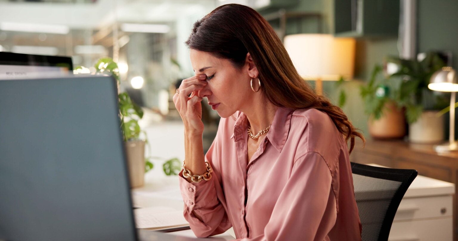 Woman experiencing brain fog and fatigue from hormone imbalance.